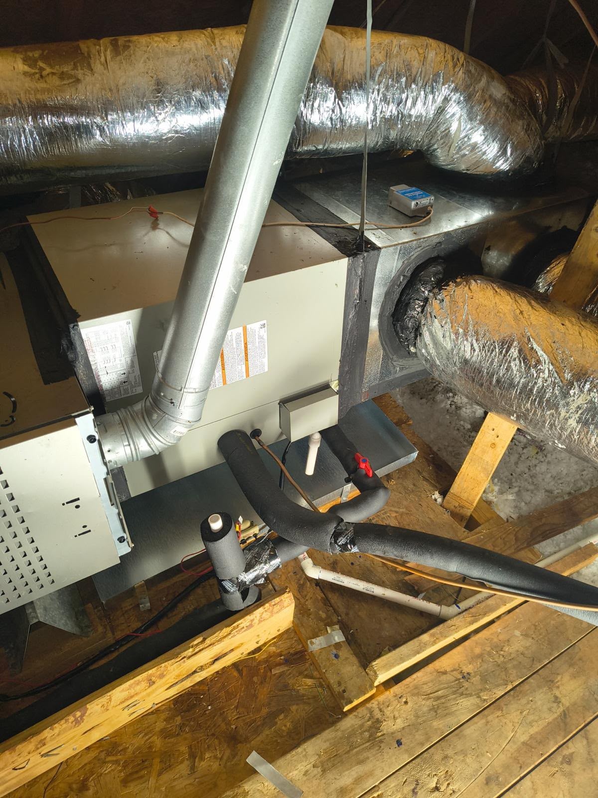 hvac-repair Service man adjusting house heating system