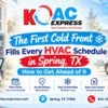 Homeowner switching a thermostat from cool to heat as the first fall cold front approaches Spring, TX